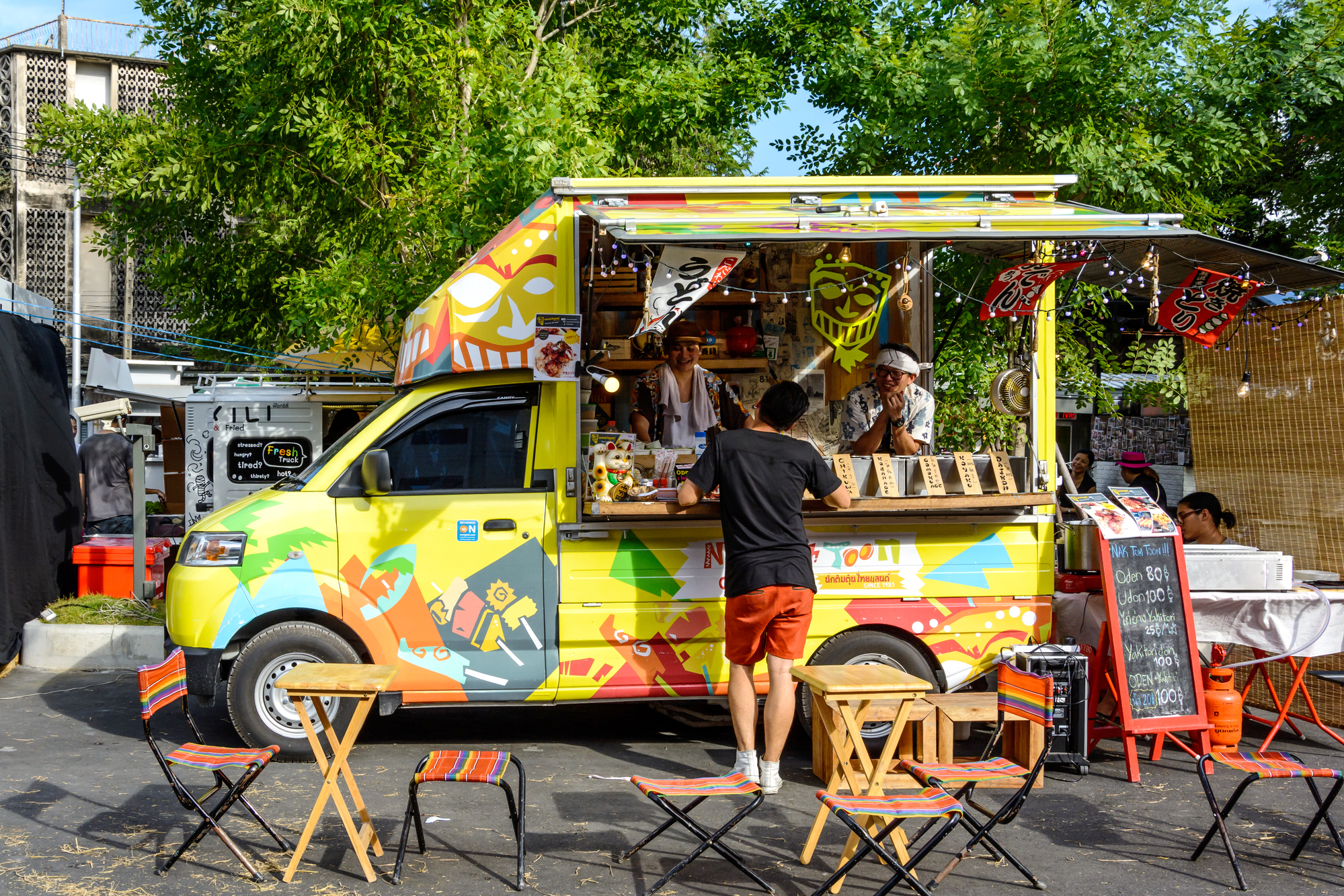 Bangkok, Thailand 25 July,2015: People order meal from food trucks at Food Truck Fair in Bangkok.